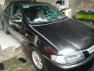 Mazda 323 1998 - Bán xe màu đen, đk tháng 12/1999, giá 115 triệu đồng