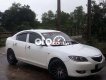 Mazda 3 cần bàn gấp 2008 - cần bàn gấp