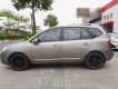 Kia Carens 2011 - Xe màu xám