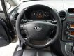 Kia Carens 2011 - Xe màu xám