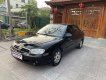 Kia Spectra 2005 - Màu đen, giá 77tr