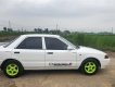 Mazda 323 1995 - Cần bán xe màu trắng