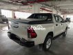 Toyota Hilux Bán xe bán tải   E2.4 AT , 2019 trắng 2019 - Bán xe bán tải toyota hilux E2.4 AT , 2019 trắng