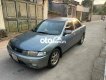 Mazda 323 cần bán xe masda  GLXI sx1999. 1999 - cần bán xe masda 323 GLXI sx1999.