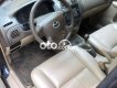 Mazda 323 .-2004 2004 - MAZDA.323-2004