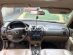 Mazda 323 .-2004 2004 - MAZDA.323-2004