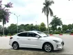 Hyundai Elantra 1.6 AT 2021 - Cần bán xe Hyundai Elantra 1.6 AT sản xuất 2021, màu trắng, xe gia đình chạy ít