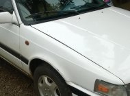 Mazda 323 1989 - Cần bán xe Mazda 323 đời 1989, màu trắng, nhập khẩu giá 65 triệu tại Đồng Nai