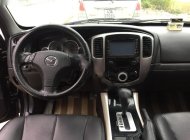 Mazda Tribute 2009 - Cần bán Mazda Tribute đời 2009, màu đen, xe nhập số tự động giá 396 triệu tại Đà Nẵng