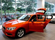 BMW 1 Series 118i 2017 - BMW 1 Series 118i 2017, màu cam. BMW Đà Nẵng bán xe BMW 118i nhập khẩu chính hãng, giá rẻ nhất giá 1 tỷ 328 tr tại Bình Định