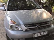 Kia Carnival 2011 - Bán Kia Carnival đời 2011, màu bạc   giá 450 triệu tại Tp.HCM