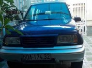 Suzuki Grand vitara 2005 - Cần bán gấp Suzuki Grand Vitara năm 2005, màu xanh   giá 230 triệu tại Đồng Nai