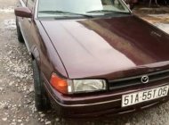 Mazda 323 1988 - Cần bán gấp Mazda 323 sản xuất 1988, màu nâu giá 95 triệu tại Tp.HCM