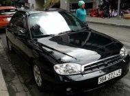 Kia Spectra 2004 - Bán Kia Spectra đời 2004, màu đen   giá 135 triệu tại Lào Cai