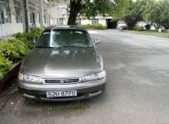 Mazda 626  MT 1998 - Bán Mazda 626 MT sản xuất 1998, màu vàng số sàn giá 168 triệu tại Tp.HCM