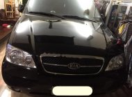 Kia Carnival GS 2006 - Bán Kia Carnival GS đời 2006, màu đen như mới, giá 255tr giá 255 triệu tại Tp.HCM