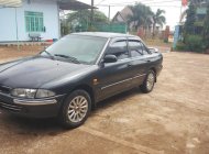 Mitsubishi Proton 1999 - Bán xe Mitsubishi Proton đời 1999, màu xám (ghi), nhập khẩu nguyên chiếc giá 100 triệu tại Gia Lai