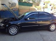 Ford Mondeo   MT 2004 - Chính chủ bán xe Ford Mondeo MT đời 2004, màu đen, 250tr giá 250 triệu tại Kon Tum