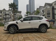 Mazda CX 5 2.0 AT 2011 - Bán xe Mazda CX 5 2.0 năm 2011, màu trắng   giá 772 triệu tại Hà Nội