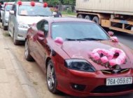 Hyundai Tuscani 2.0MT 2005 - Cần bán Hyundai Tuscani 2.0MT năm 2005, màu đỏ, xe nhập xe gia đình giá cạnh tranh giá 365 triệu tại Đà Nẵng