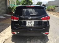 Kia Rondo   2014 - Cần bán gấp Kia Rondo đời 2014, màu đen số tự động, giá tốt giá 540 triệu tại An Giang