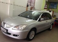 Mitsubishi Lancer GLX 1.6AT 2006 - Cần bán gấp Mitsubishi Lancer GLX 1.6AT đời 2006, màu bạc còn mới giá 275 triệu tại Tp.HCM