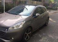 Peugeot 208 2014 - Cần bán lại xe Peugeot 208 đời 2014, màu nâu giá 500 triệu tại Tp.HCM