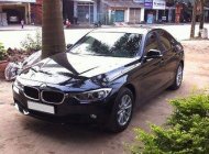 BMW 3 Series 320i 2012 - Bán BMW 3 Series 320i đời 2012, màu đen giá 110 triệu tại Bình Thuận  