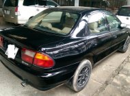 Mazda 323F 2001 - Cần bán xe Mazda 323F đời 2001, màu đen, giá 125tr giá 125 triệu tại An Giang
