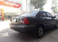 Ford Laser  Ghina 1.8 2002 - Bán Ford Laser Ghina 1.8 đời 2002, màu đen giá 215 triệu tại Kon Tum