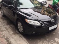 Toyota Camry LE 2007 - Chính chủ bán xe Toyota Camry LE đời 2007, màu đen, nhập khẩu giá 568 triệu tại Hà Nội