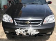 Chevrolet Lacetti 2014 - Cần bán lại xe Chevrolet Lacetti đời 2014, màu đen, giá tốt giá 330 triệu tại Bến Tre