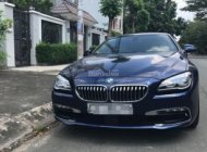 BMW 6 Series 640i 2015 - Bán BMW 640i xanh SX 2015, đã đi 1300km giá 2 tỷ 450 tr tại Tp.HCM