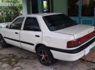 Mazda 323 1995 - Cần bán lại xe Mazda 323 đời 1995, màu trắng, xe nhập, giá 72tr giá 72 triệu tại An Giang