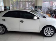 Kia Forte AT 2013 - Nhà cần bán xe Kia Forte 2013 AT, màu trắng, xe chính chủ gia đình sử dụng giá 398 triệu tại Tp.HCM