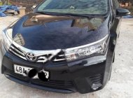 Toyota Corolla altis 2014 - Cần bán gấp Toyota Corolla altis đời 2014, màu đen chính chủ giá 590 triệu tại Đắk Nông