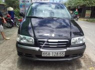 Hyundai Trajet 2004 - Bán Hyundai Trajet đời 2004, màu đen, nhập khẩu số tự động, 275tr giá 275 triệu tại Cần Thơ