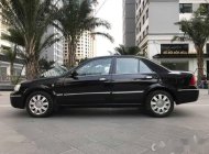 Ford Laser   Deluxe AT 2006 - Bán Ford Laser Deluxe AT đời 2006, màu đen xe gia đình, giá 265tr giá 265 triệu tại Hà Nội