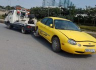 Ford Taurus   AT  1997 - Cần bán lại xe Ford Taurus AT đời 1997, màu vàng, 150tr giá 150 triệu tại Hà Nội