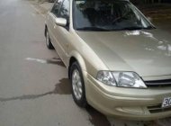 Ford Laser 2001 - Bán Ford Laser sản xuất 2001, màu vàng giá 145 triệu tại Hòa Bình