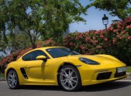 Porsche Cayman 718 2017 - Cần bán lại xe Porsche Cayman 718 2017, màu vàng, nhập khẩu nguyên chiếc như mới giá 4 tỷ 900 tr tại Tp.HCM