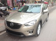 Mazda CX 5 2WD 2013 - Cần bán xe Mazda CX-5, sản xuất và đăng ký 2013 mầu vàng cát. Giá 665 triệu giá 665 triệu tại Hà Nội