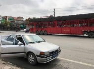 Mazda 323F   1995 - Bán xe Mazda 323F sản xuất năm 1995, màu bạc giá 65 triệu tại Bình Phước