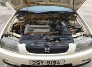 Mazda 323 MT 2000 - Bán xe Mazda 323 MT năm sản xuất 2000, màu trắng giá 98 triệu tại Vĩnh Phúc