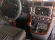 Kia Carnival  GS 2.5  2005 - Bán Kia Carnival GS 2.5 2005, màu bạc, giá 240tr giá 240 triệu tại Long An