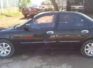 Kia Spectra 1.6 MT 2003 - Cần bán Kia Spectra 1.6 MT đời 2003, màu đen, giá 128tr giá 128 triệu tại Đắk Nông