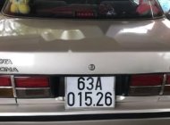 Toyota Corolla altis 2.0  1990 - Cần bán xe Toyota Corolla Altis 2.0 năm sản xuất 1990, màu ghi vàng giá 105 triệu tại Bình Dương