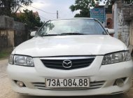 Mazda 626 2002 - Cần bán gấp Mazda 626 2002, màu trắng giá 169 triệu tại Quảng Bình