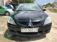 Mitsubishi Lancer 1.6 2004 - Cần bán Mitsubishi Lancer 1.6 sản xuất 2004, màu đen giá 210 triệu tại Cần Thơ