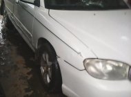 Kia Spectra 1.6 MT 2004 - Cần bán xe Kia Spectra 1.6 MT đời 2004, màu trắng, 106 triệu giá 106 triệu tại Bình Định